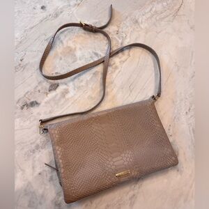 Gigi New York leather cross body in a putty color with tassel